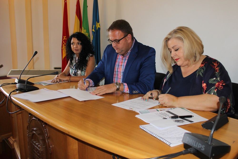 FIRMA CONVENIO TRABAJO SOCIAL